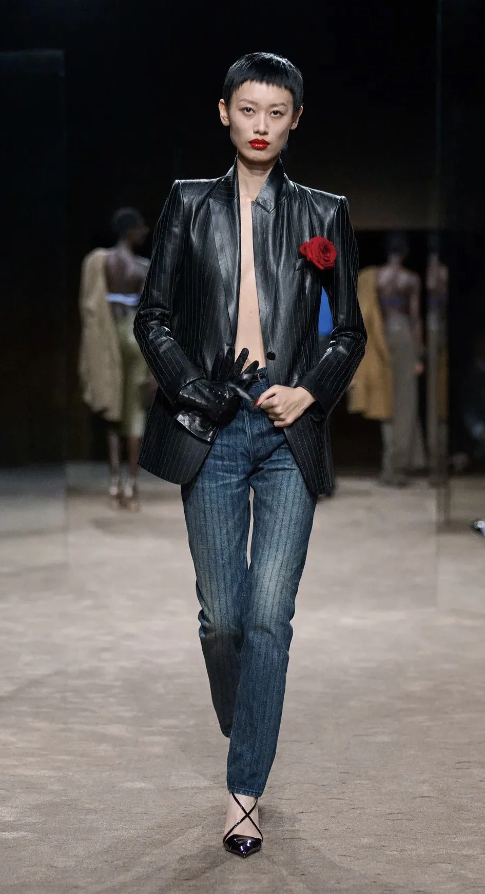 Tom Ford — pinstripes, denim and a red rose.