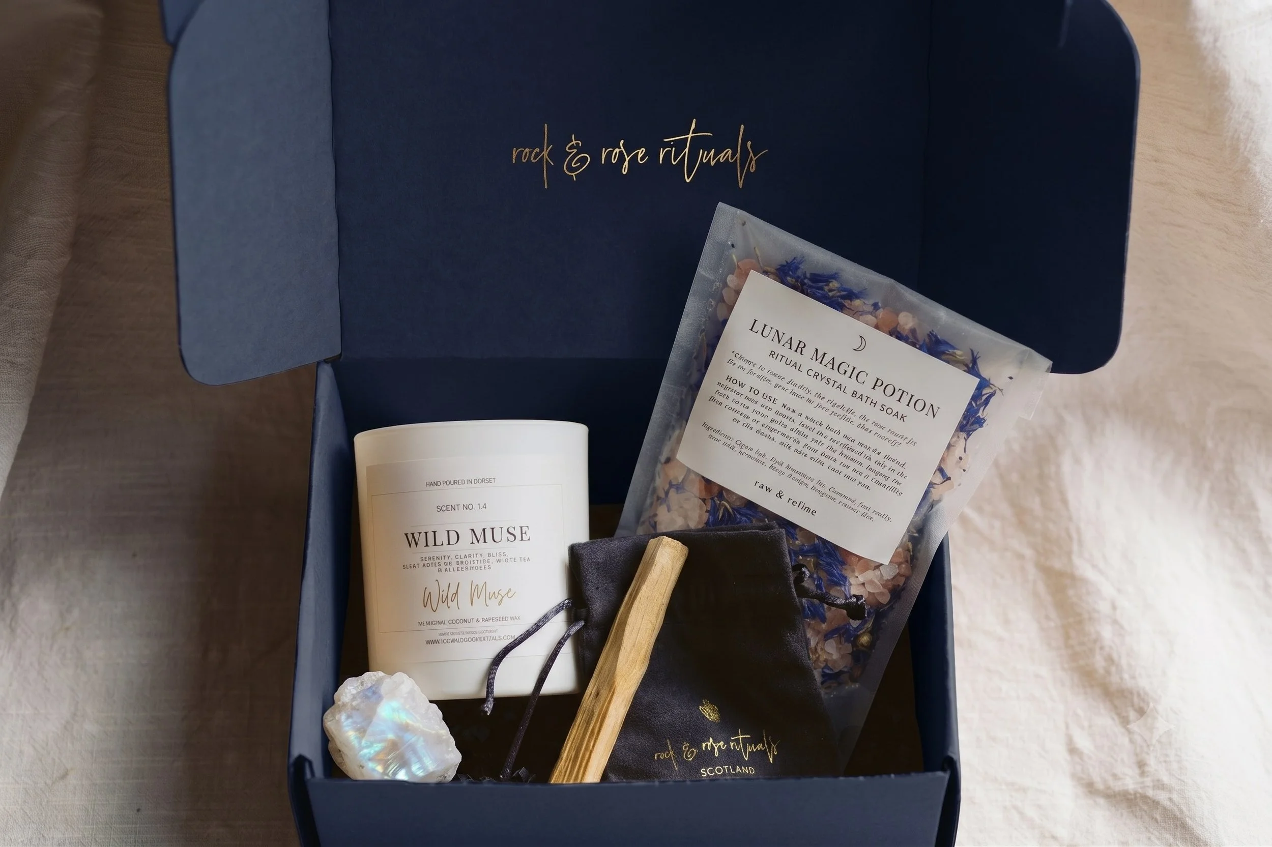The Rock and Rose Rituals navy and gold ritual box