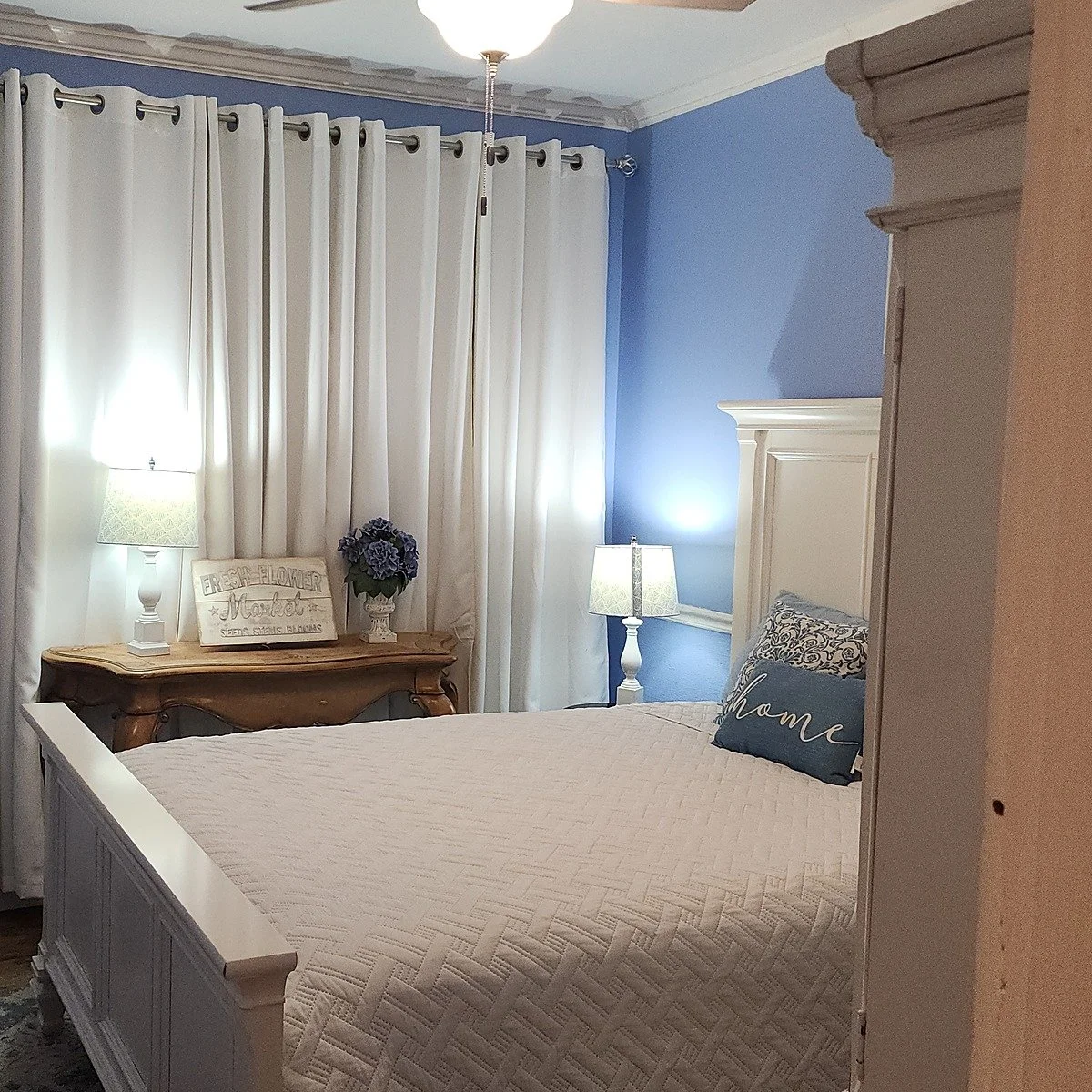 The Periwinkle Room, a guest suite with periwinkle blue walls