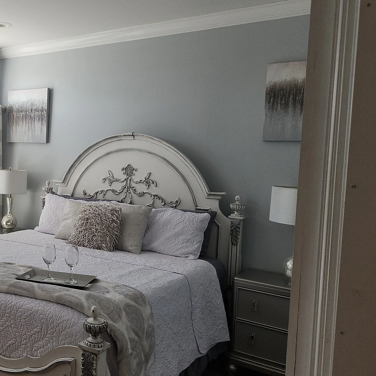 The master suite bedroom at Your Boutique Hotel