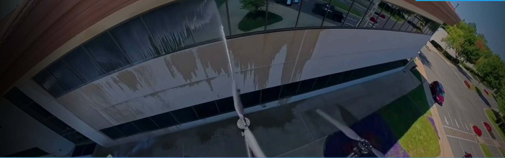 DRIP FPV drone performing commercial exterior cleaning