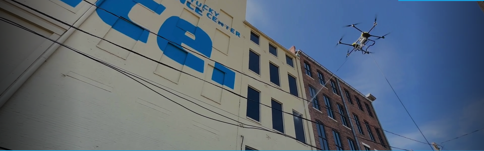 DRIP drone cleaning Kentucky Science Center exterior in Louisville