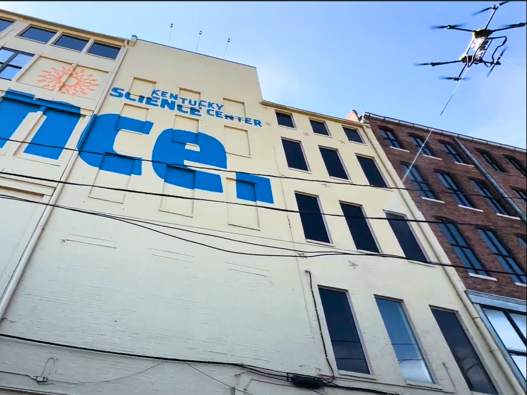 Drone cleaning building facade