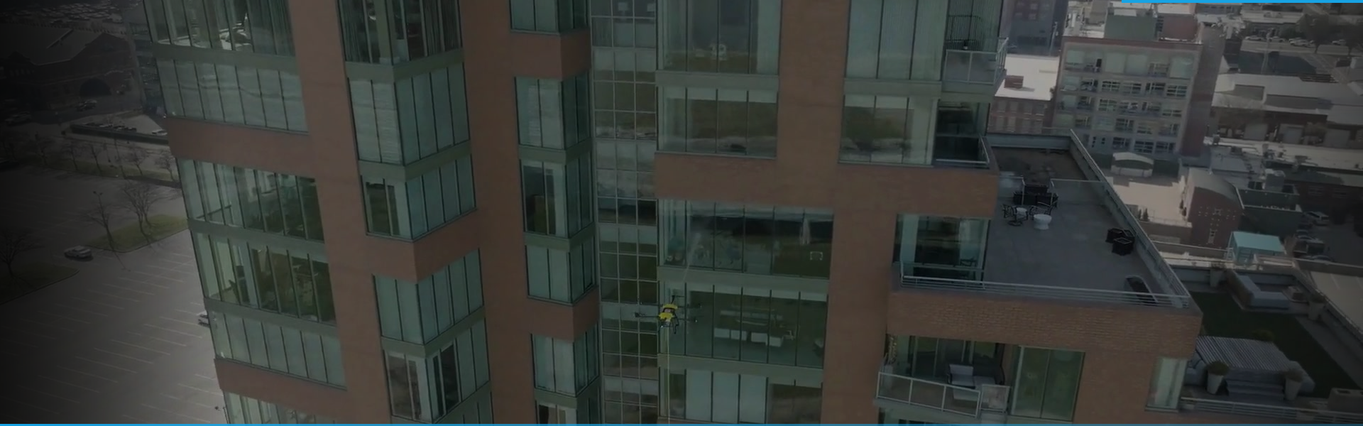 DRIP drone cleaning Waterfront Park Place high-rise exterior in Louisville