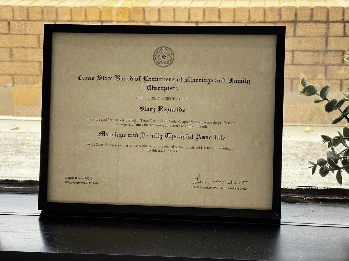 Licensed Marriage and Family Therapist-Associate license, Texas #205804, displayed at Brain & Heart Healing office in Abilene, TX