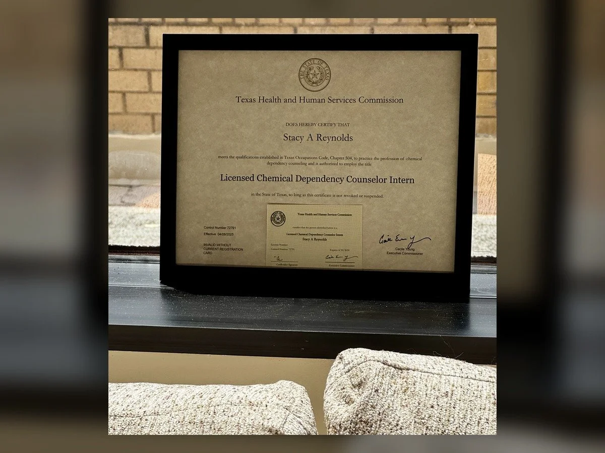 Licensed Chemical Dependency Counselor-Intern license, Texas #72791, displayed at Brain & Heart Healing office in Abilene, TX