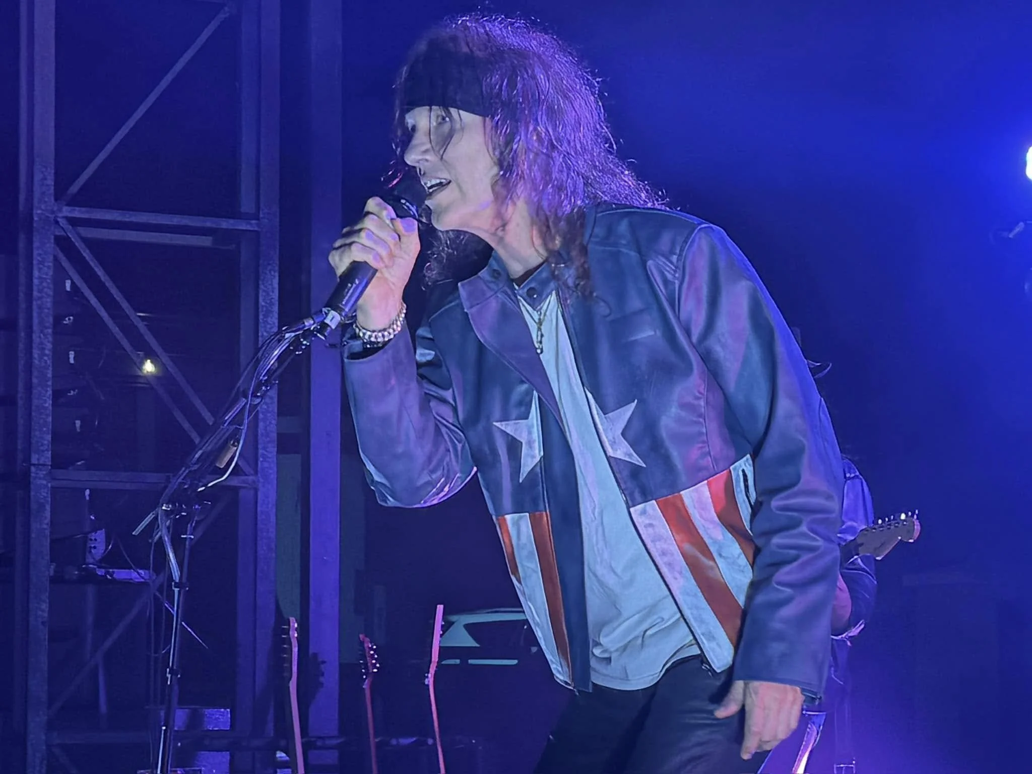 Slippery When Wet frontman singing on stage