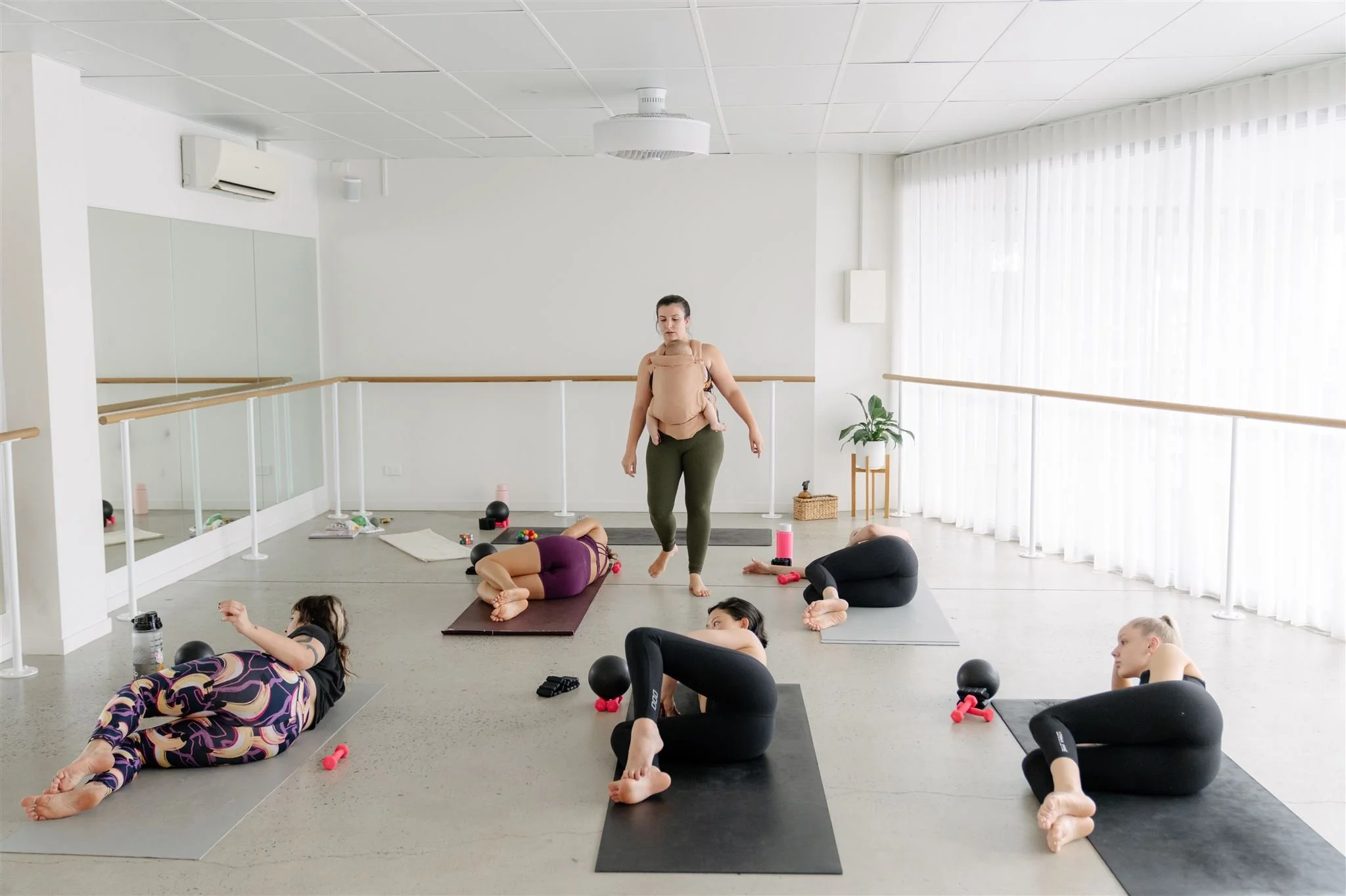 Claudia — baby carrier Pilates