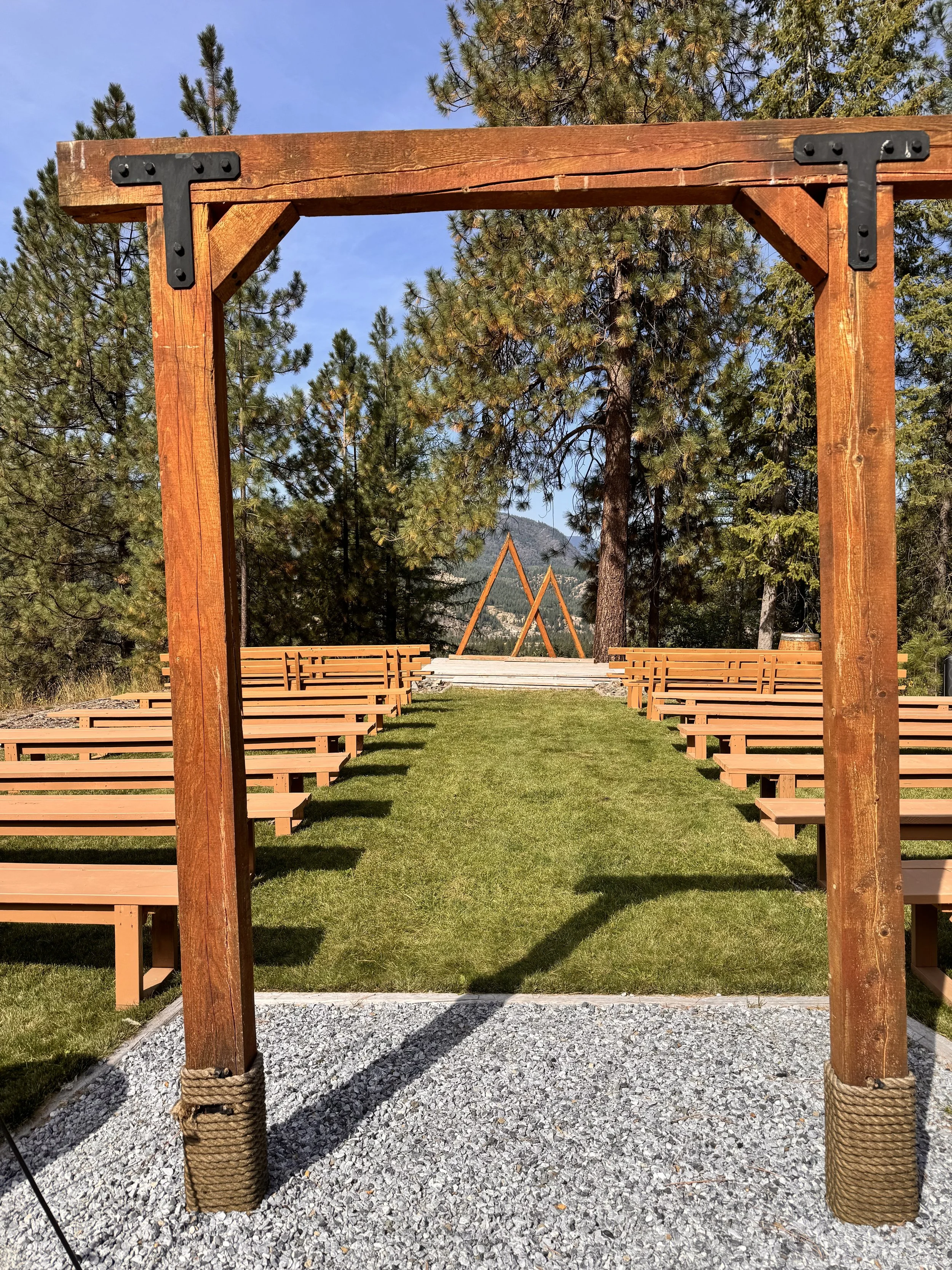 Mountain Soul ceremony site framed by the timber entrance arch
