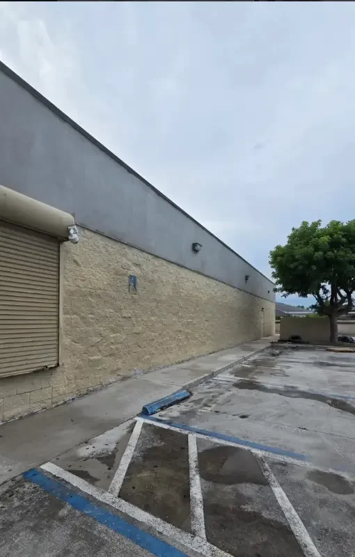 Commercial building wall before exterior painting in Miami