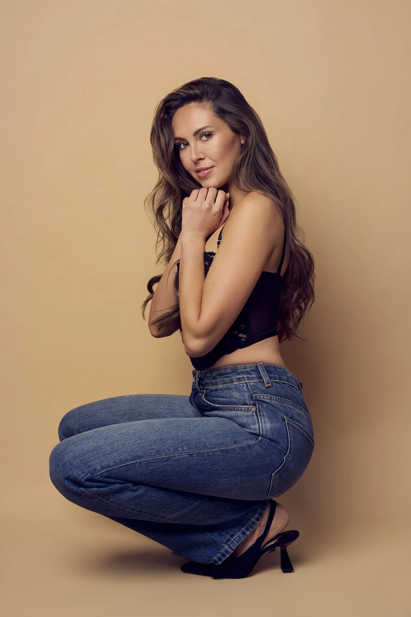 Editorial studio portrait of a woman in denim, Wilmington, NC