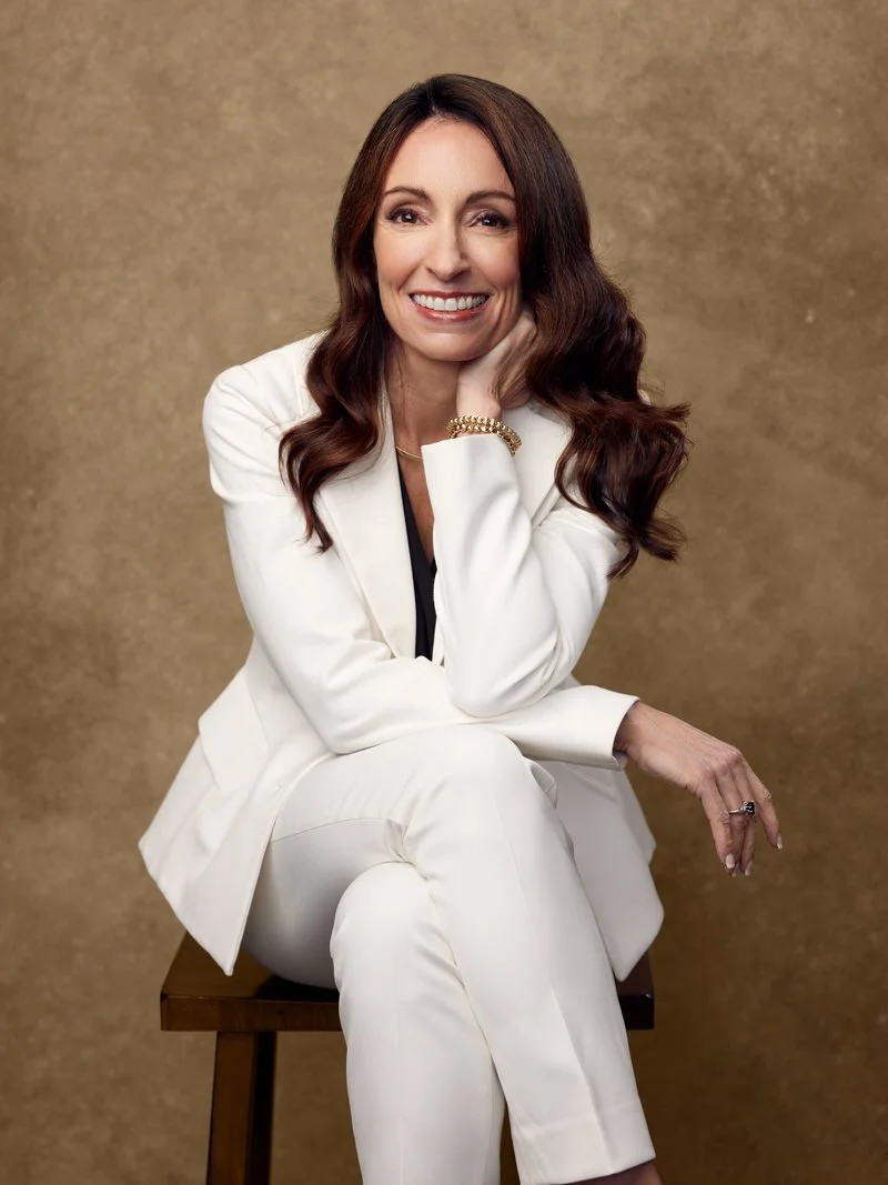 Personal brand portrait of a woman in a white suit, Wilmington, NC.