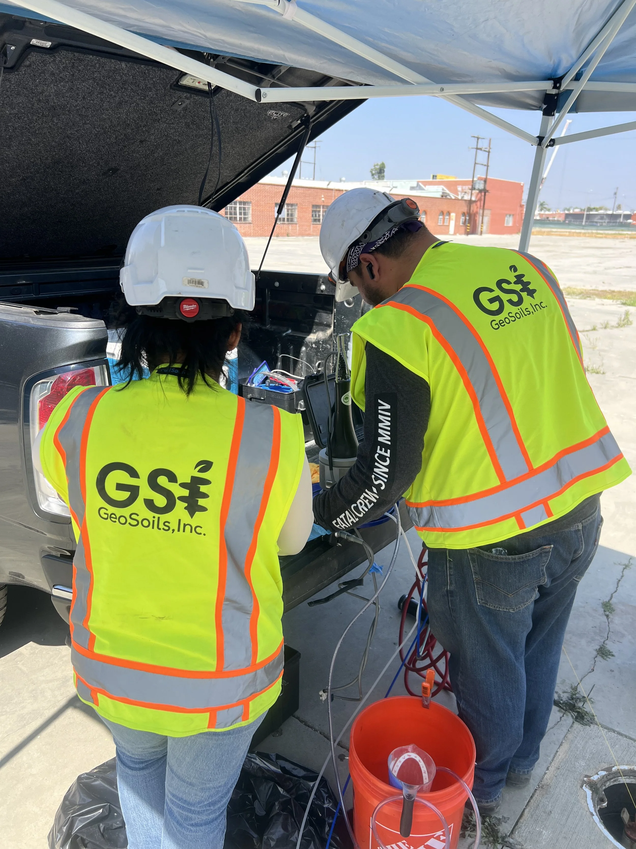 Geosoils technicians preparing equipment for environmental testing
