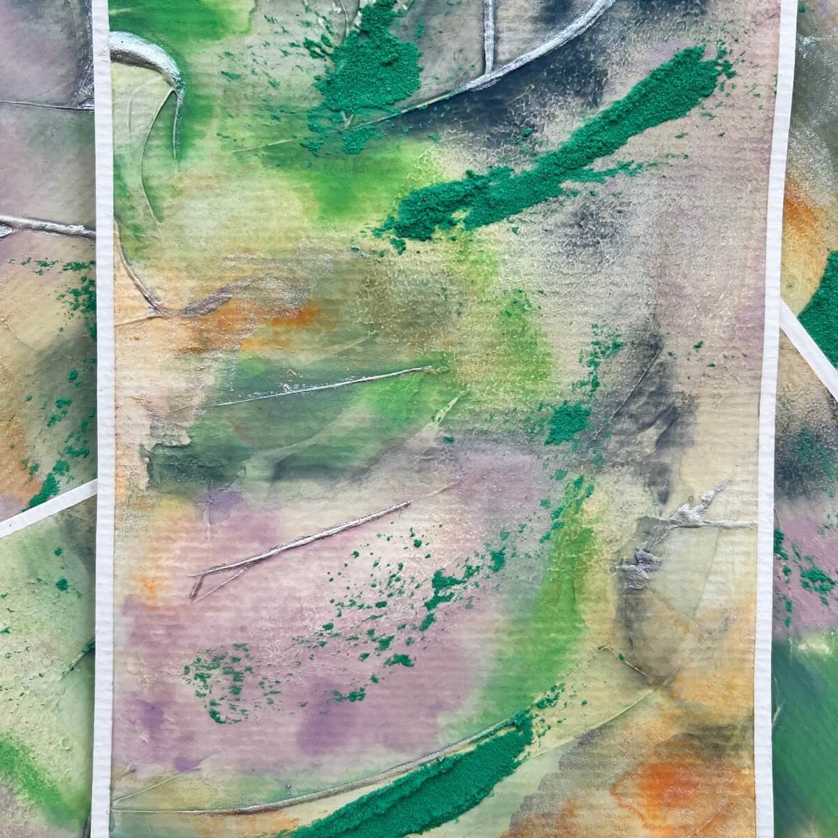 Close-up of a piece from the “Silver Feathers Rising” series – textured surface with vivid greens and flowing transitions expressing release and new beginnings.