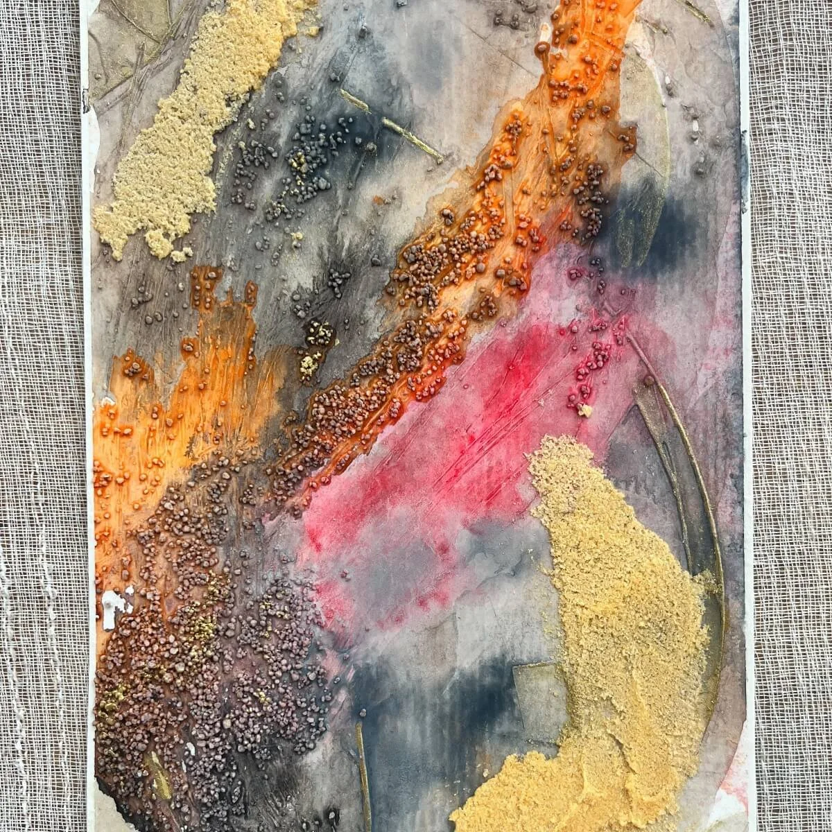 Emotional mixed media work combining fire-inspired red and ash-like black textures – No. 7 from the collection 