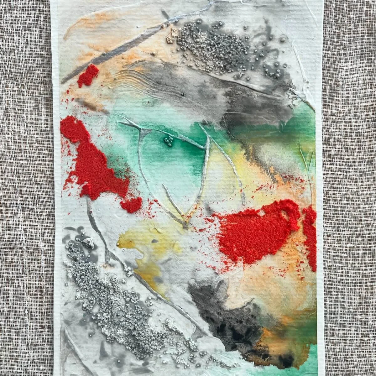 Mixed-media artwork with orange, sage green, and black textures evoking grounding and protection – No. 3 of the series Built Of Light.