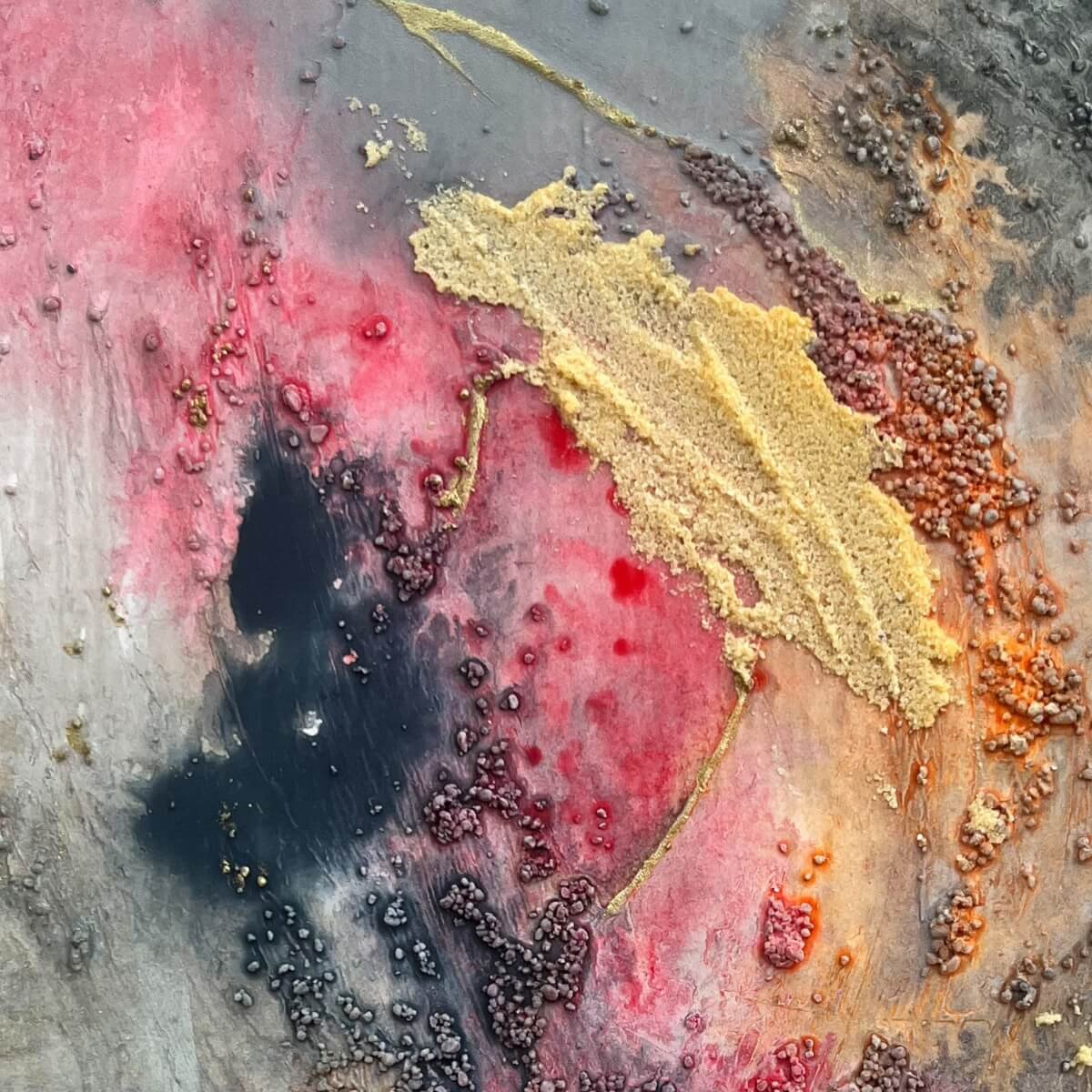 High-resolution texture detail of mixed media piece No. 5 showing glowing red pigment and crater-like gold material.