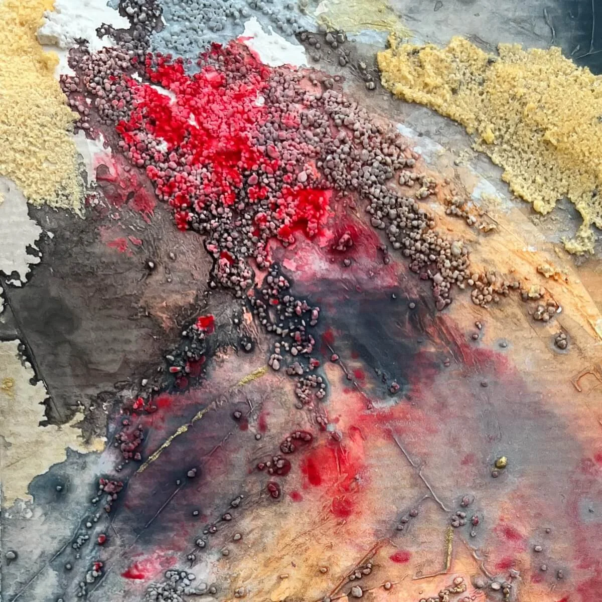 Abstract close-up of No. 8 with strong contrasts of red, black and raised gold textures on raw surface – fire-themed visual.