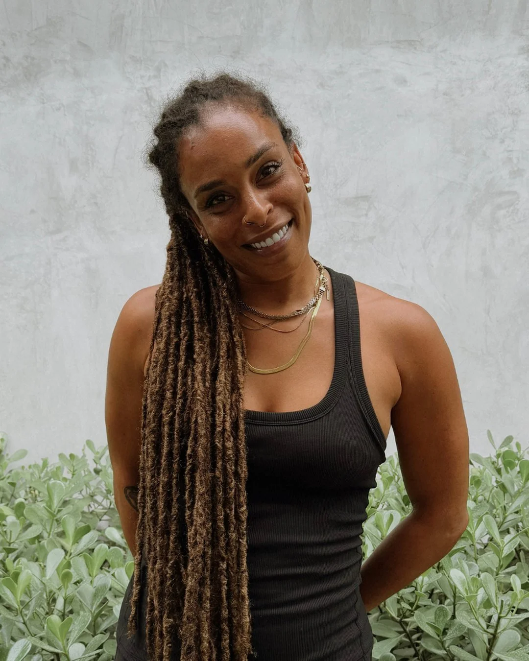 Alex, founder of Black Cat Studio Pilates, outside the studio in Nosara