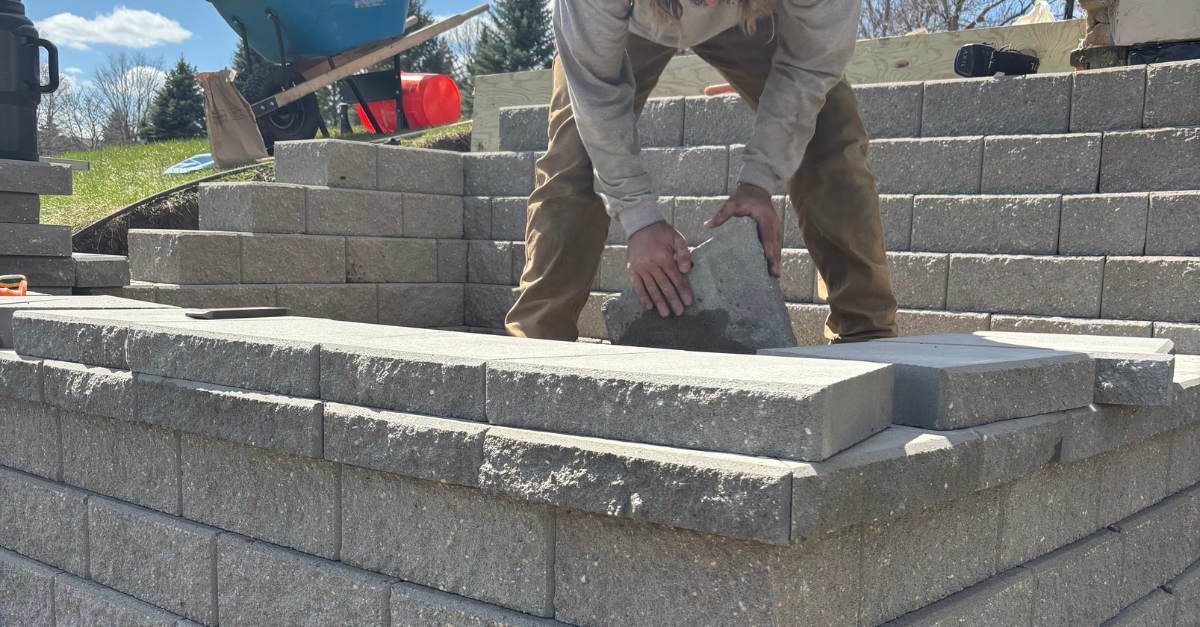 Retaining wall under construction, Relentless Landscaping