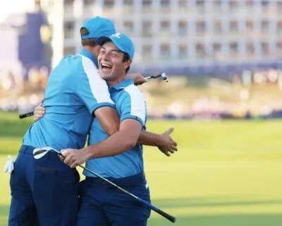 European golfers celebrating together during team competition