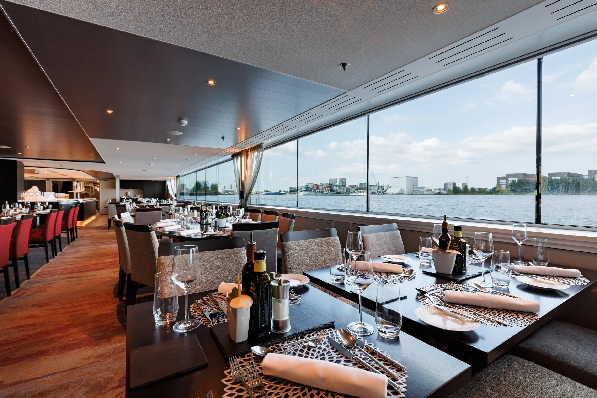 Avalon Waterways river cruise dining room set for dinner