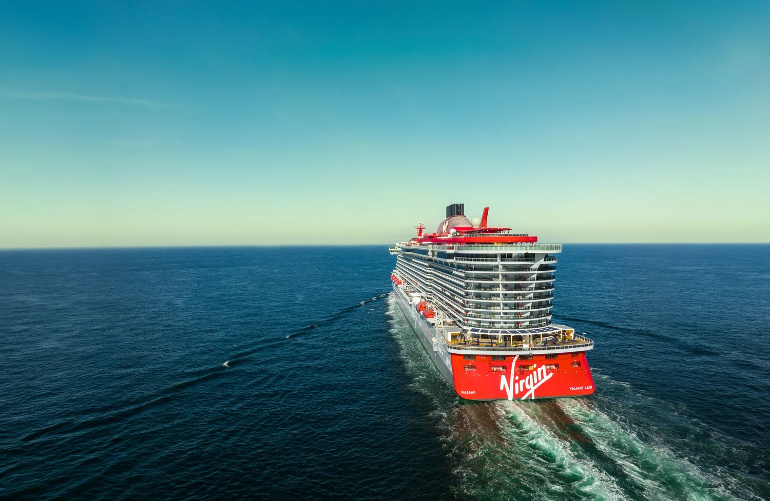 Virgin Voyages Valiant Lady sailing at sea as an example of an adults-only cruise
