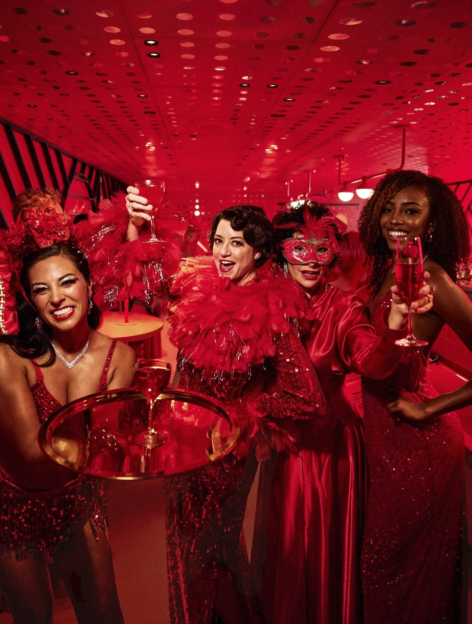Adults enjoying a lively Virgin Voyages onboard event