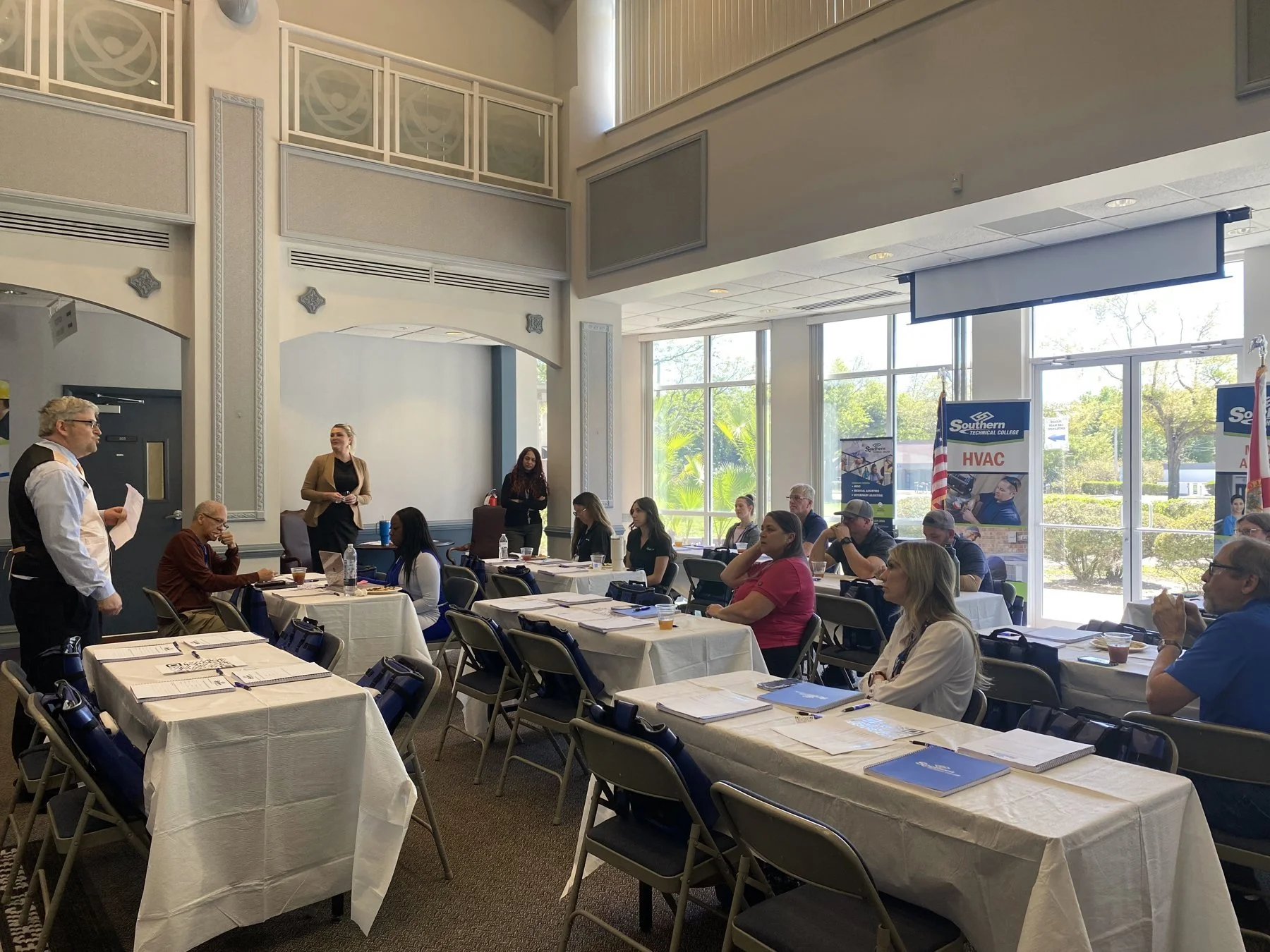 Employer and industry participants seated at a Southern Technical College Program Advisory Committee meeting while a speaker addresses the group.