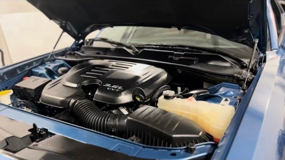 After engine bay cleaning showing a spotless and shiny engine bay