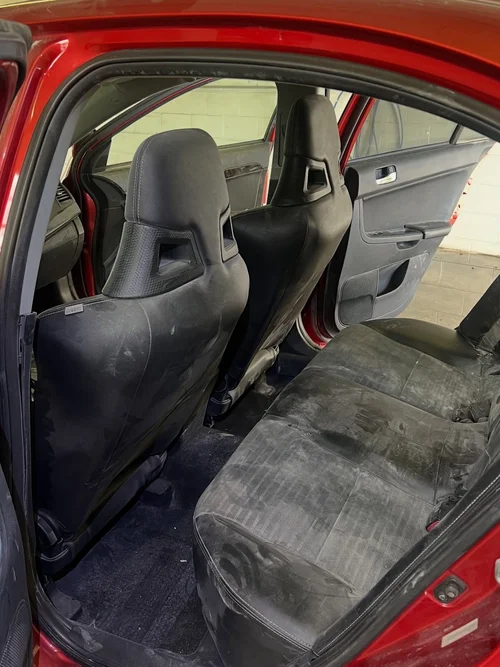 Full interior detail before, dusty cloth seats, Lincoln NE