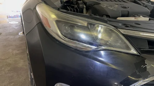 Headlight restoration before, cloudy yellow lens, Lincoln NE