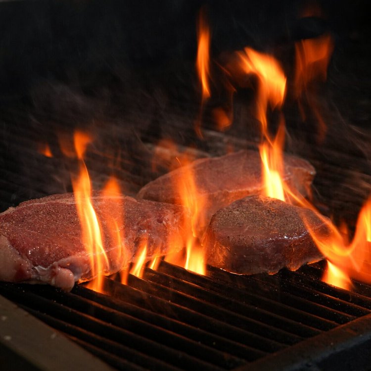 Steaks on the flame grill, Sandpiper Restaurant