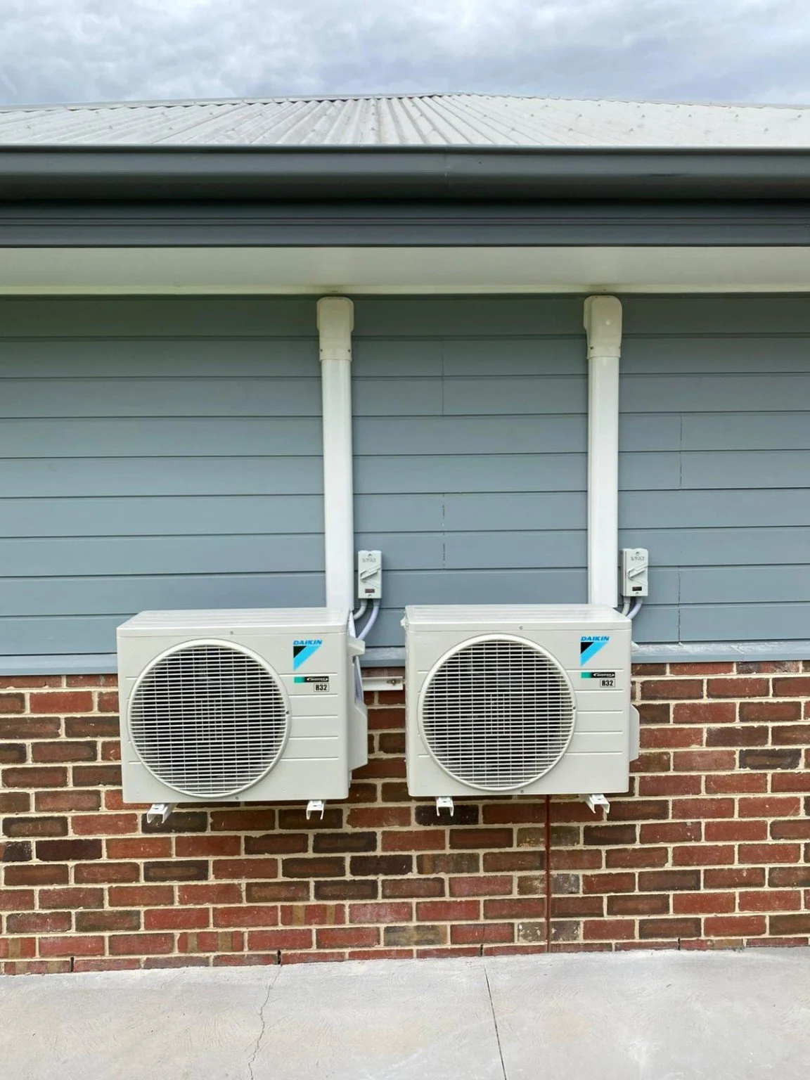 Two outdoor split-system units installed by Pro-Tech