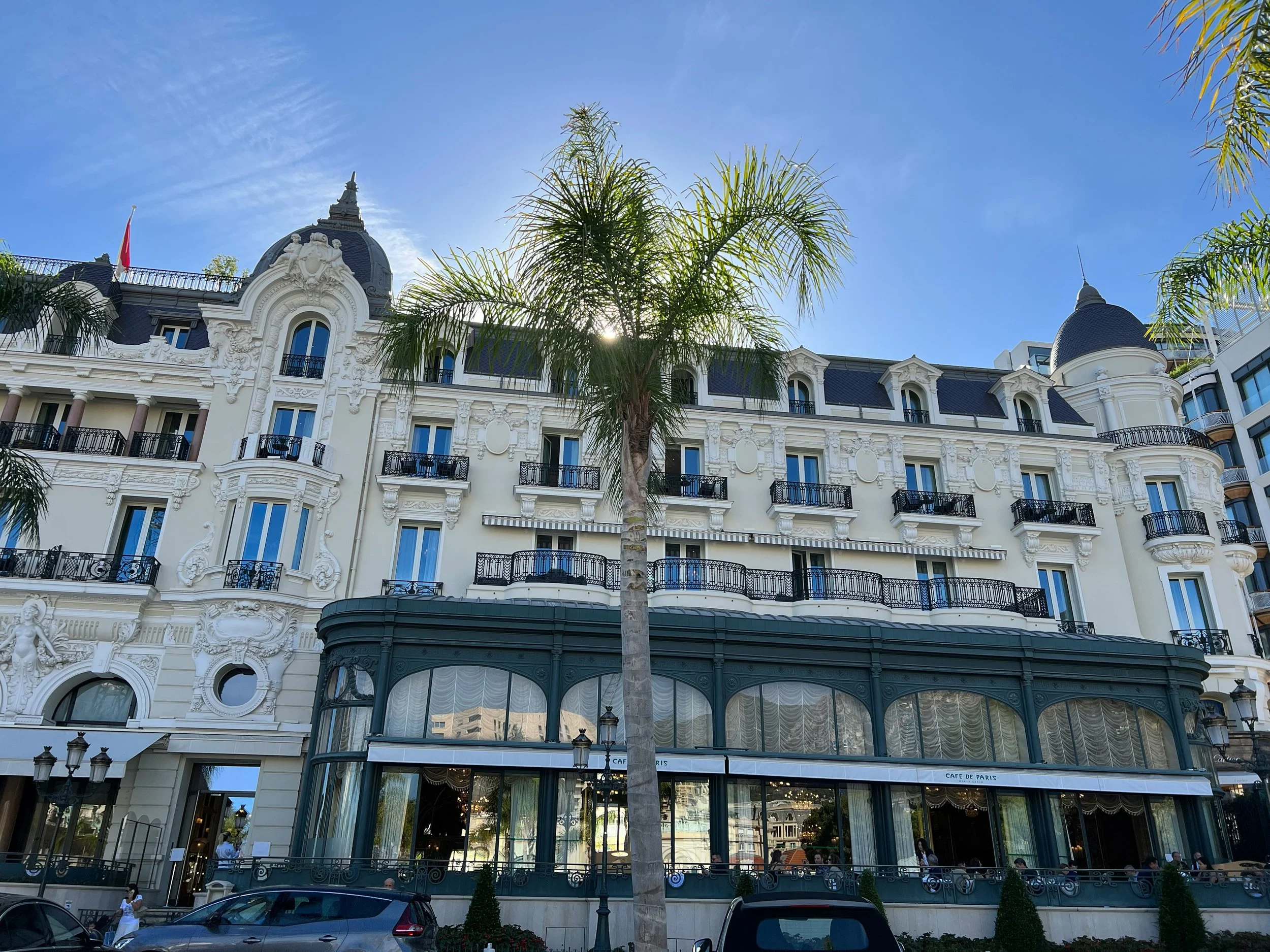 Hôtel de Paris Monte-Carlo at dusk — home to Le Louis XV by Alain Ducasse and Le Grill, two of the most celebrated Michelin-starred restaurants in Monaco