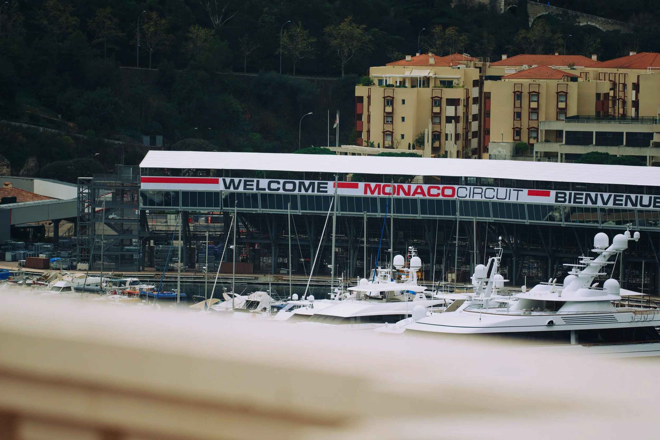 Monaco at night during Grand Prix week — Port Hercule, the casino, and the lit streets of Monte-Carlo