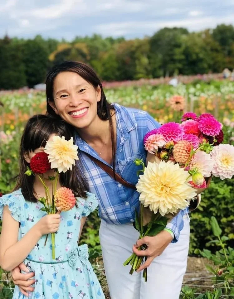South Shore Digital Wellness Director & Treasurer Ngoc Dupont with her child.