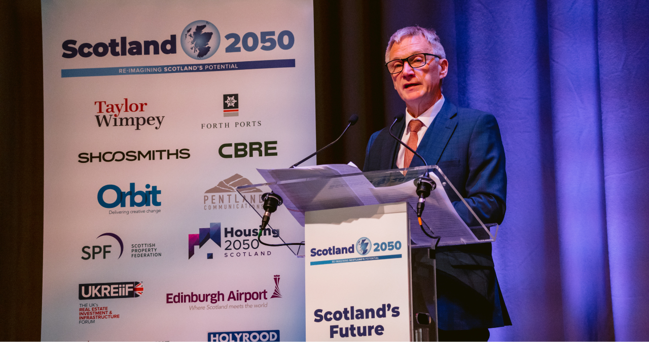 Ivan McKee MSP speaking at the podium