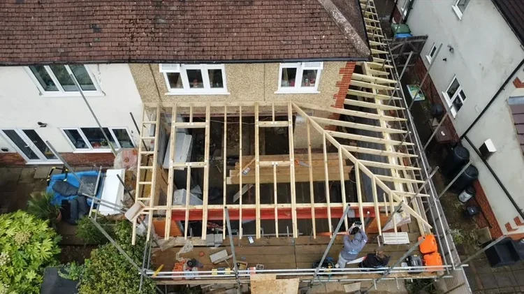 Timber rafters and joists of a roof frame seen from above
