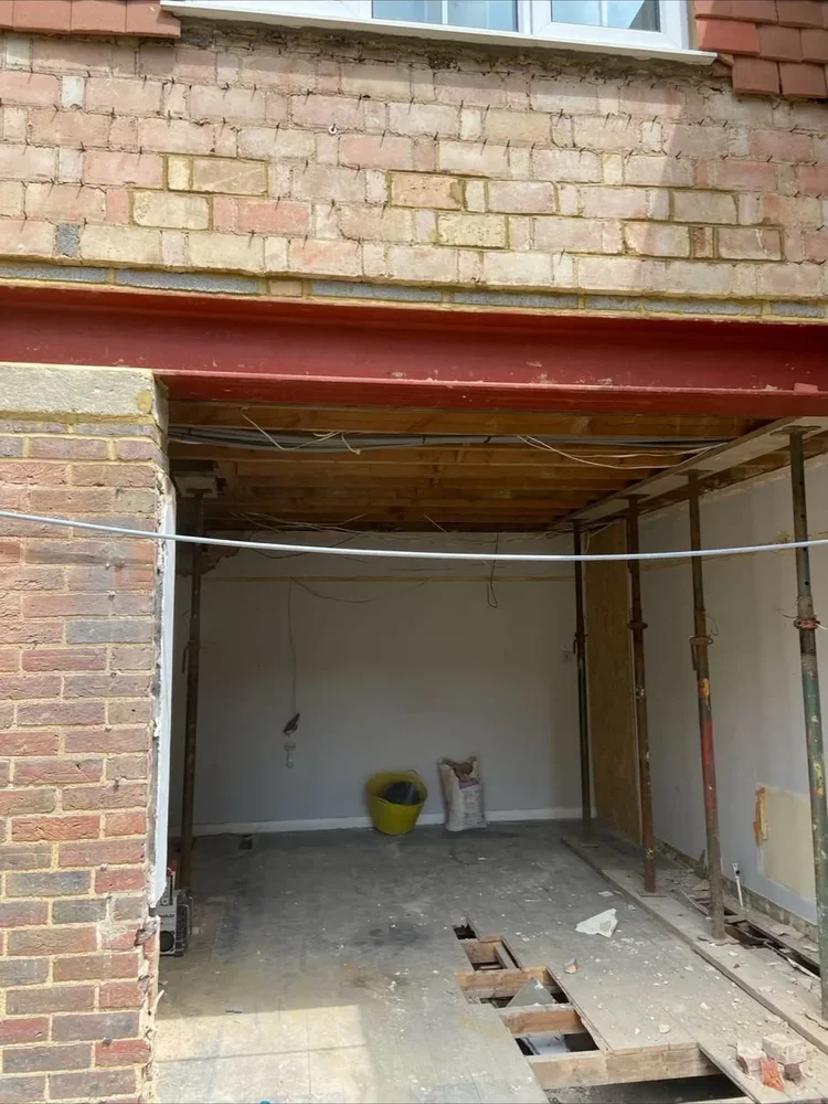 Steel beam and timber joists above a new opening
