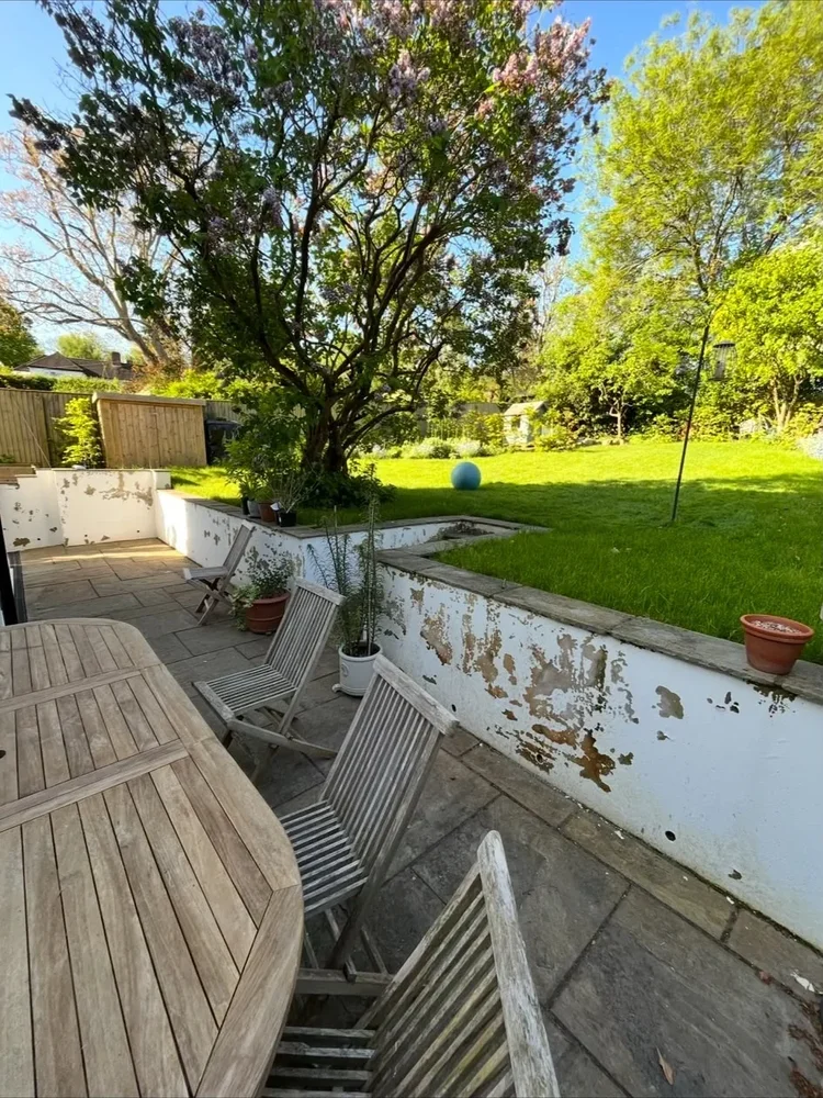 Renovated terrace and garden with sandstone paving