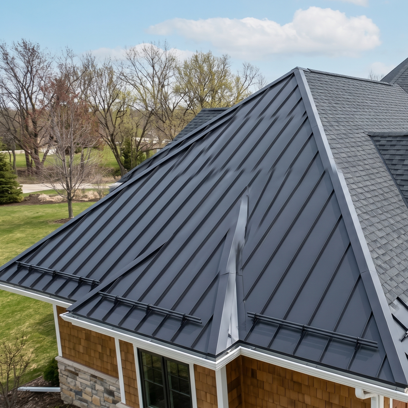 Wisconsin house with torn asphalt shingles and metal roof sample