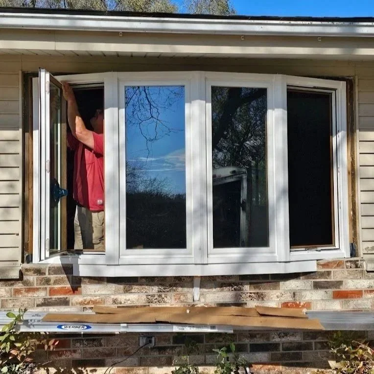 fogged double-pane residential window with moisture trapped inside