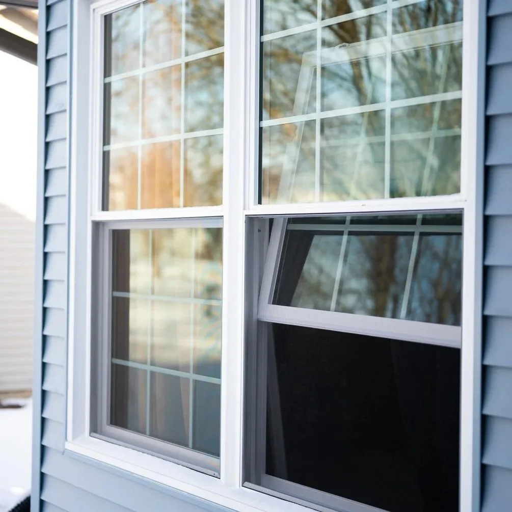 homeowner feeling cold draft near new window frame