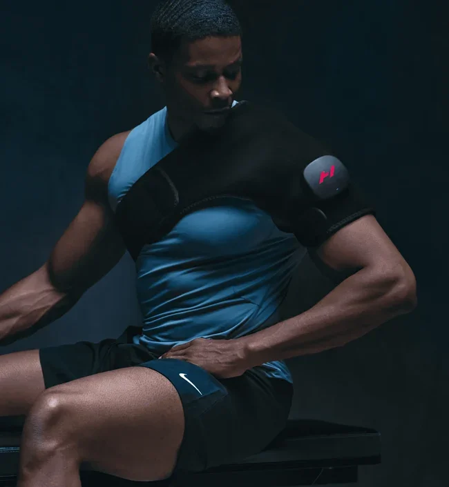 Hyperice Venom 2 shoulder wrap in use