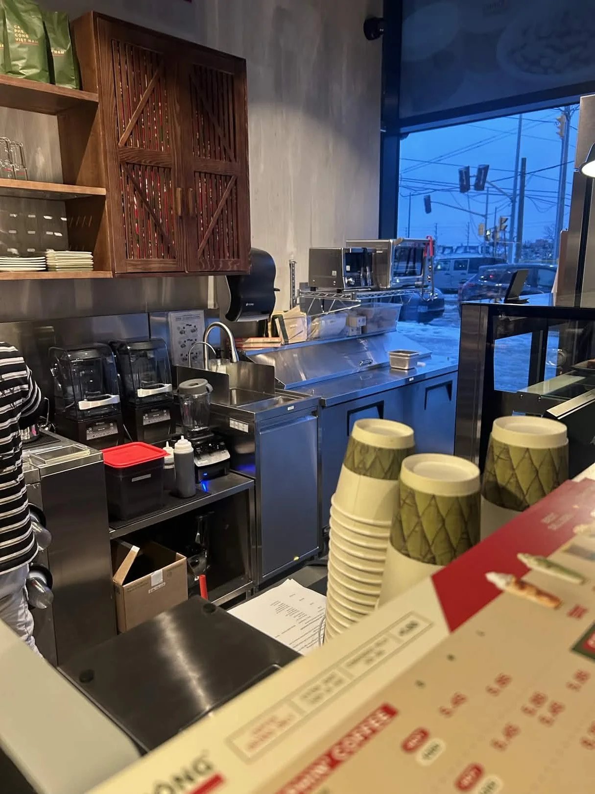 Cộng Cà Phê Mississauga counter and bar area — commercial plumbing fit-out by Portimão Plumbing