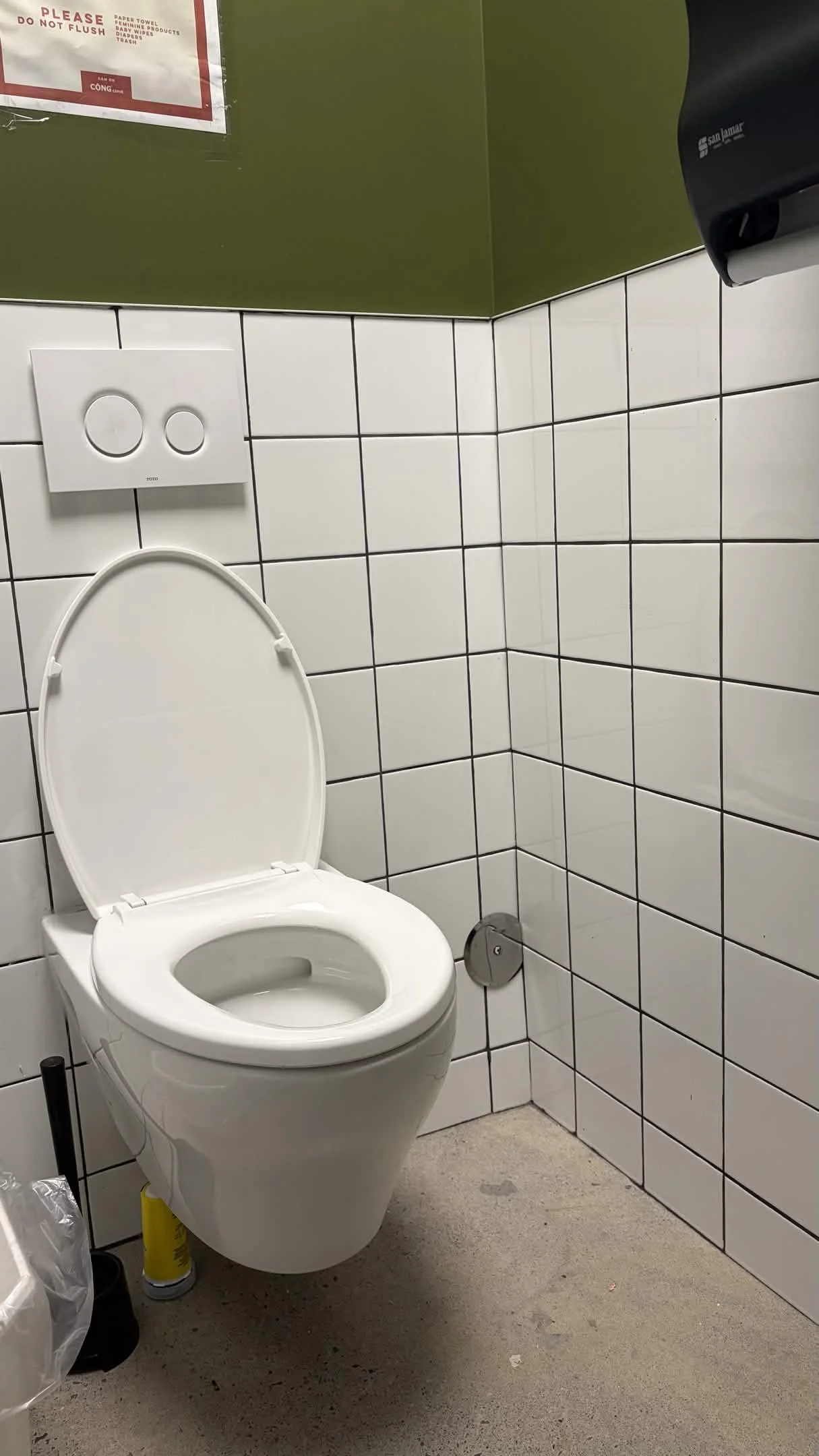 Wall-mounted toilet installation — Cộng Cà Phê Mississauga