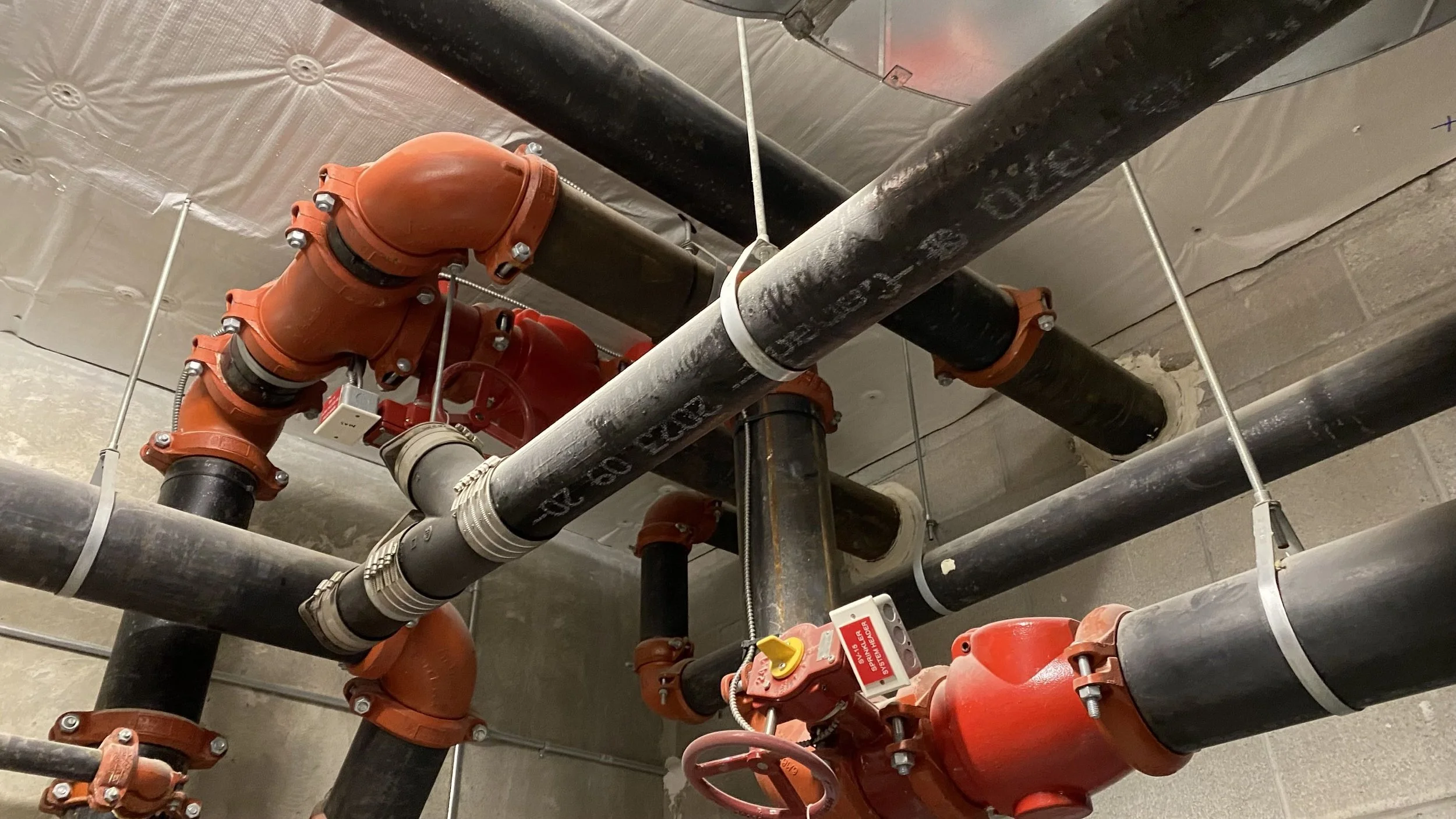 Mechanical room drain tie-ins — Cộng Cà Phê Mississauga