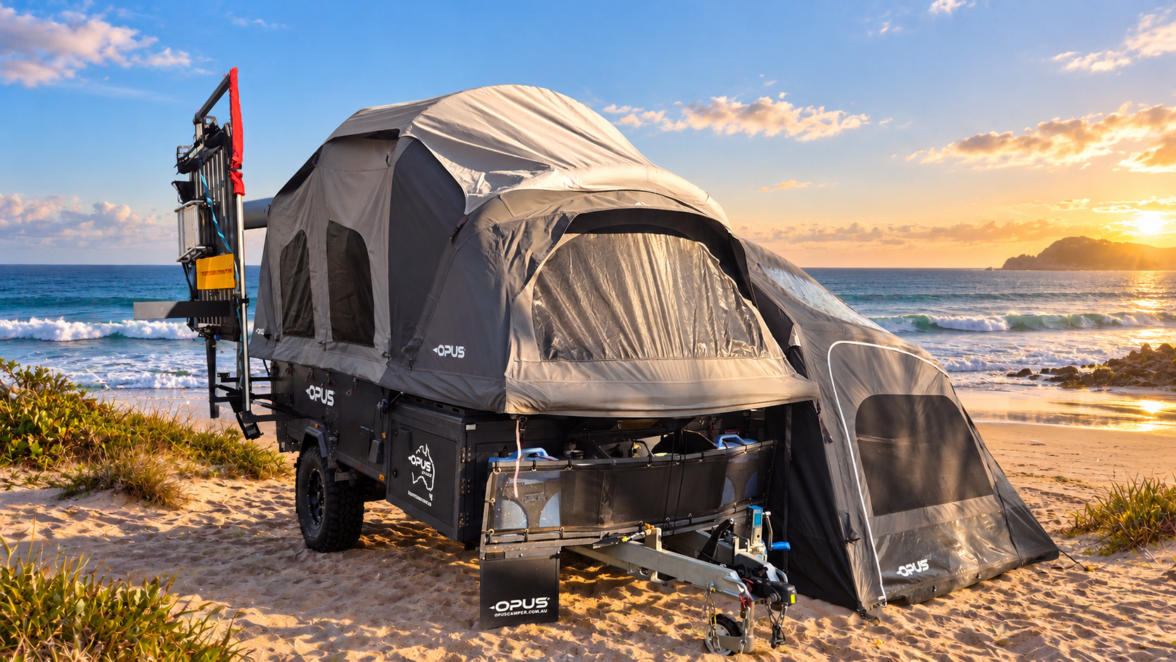 Woodstock Opus OP4 camper trailer set up at the beach