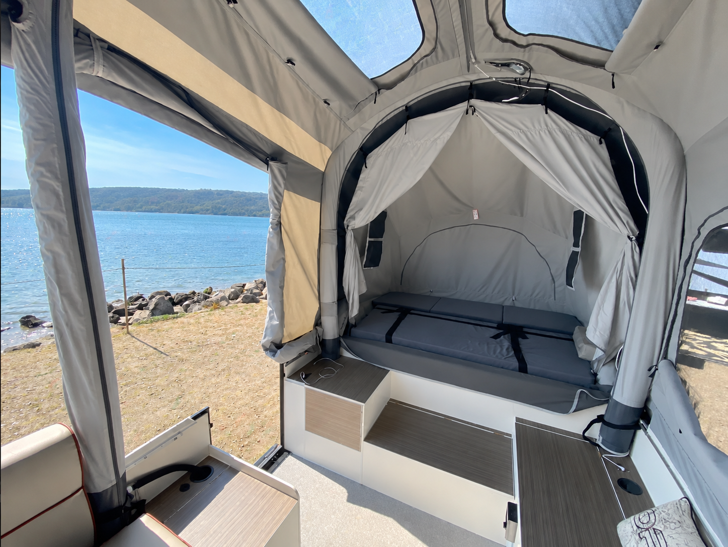 Opus OP4 interior — club lounge and memory foam sleeping pods